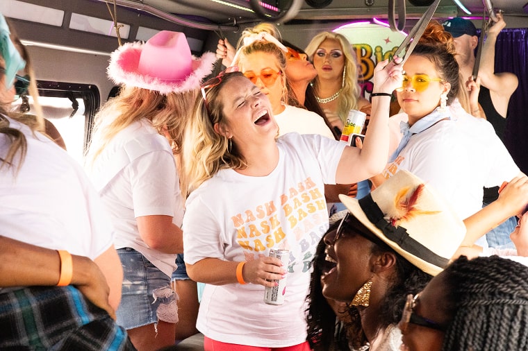 a bachelorette party dances and sings on the big drag bus tour in nashville tn