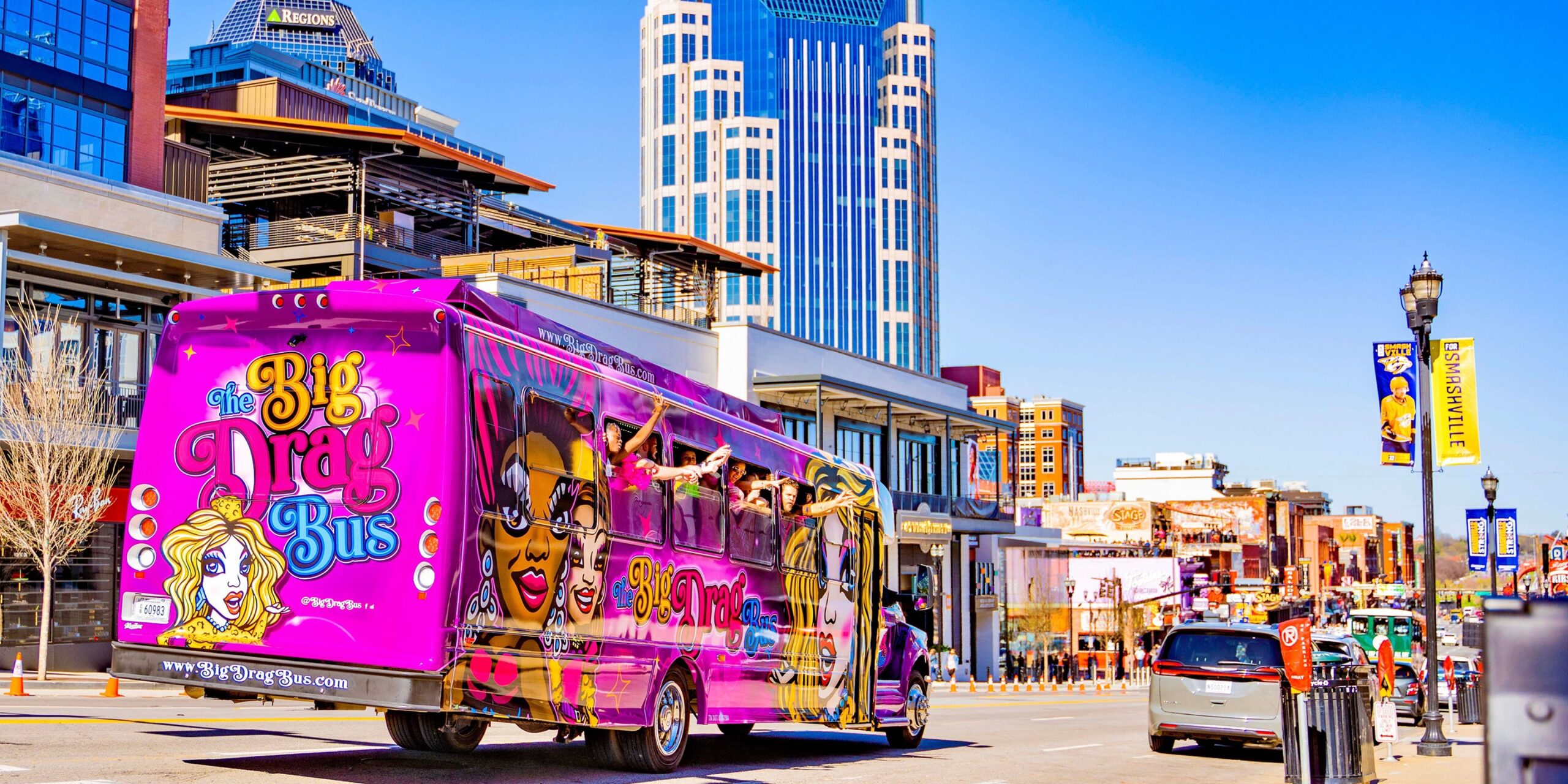 the big drag bus drives through a nashville street